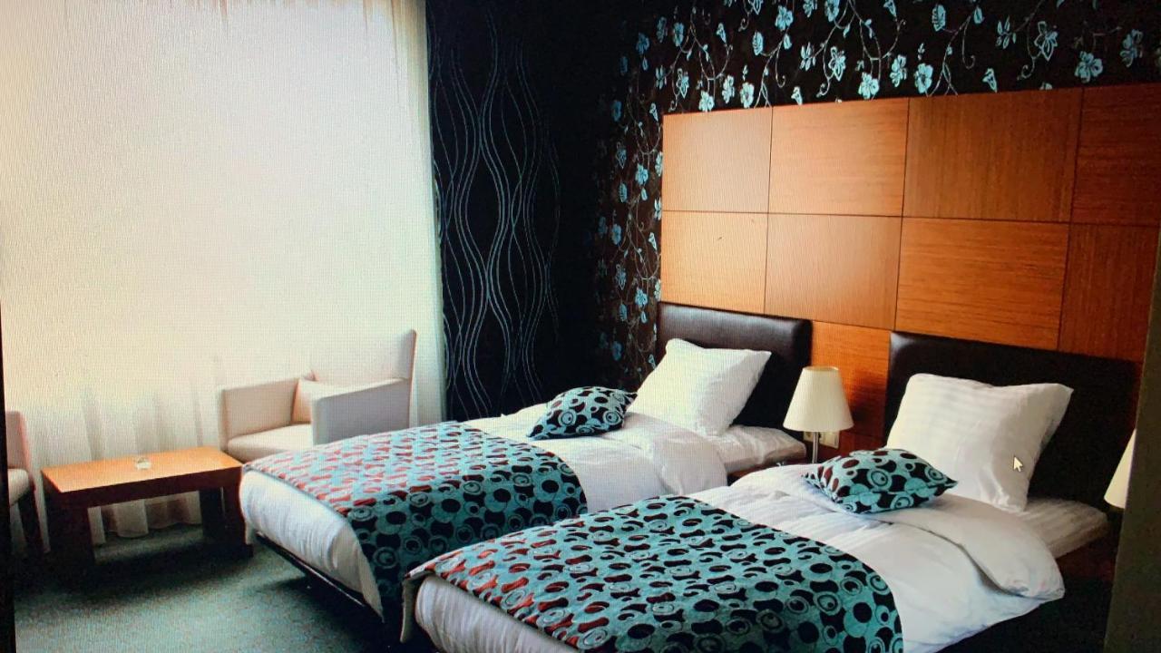 אקטאו Grand Nur Plaza Hotel מראה חיצוני תמונה